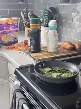 quick meal planning ingredients set out on kitchen counter next to the stove