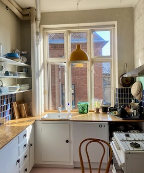 sunlight streaming through a kitchen window
