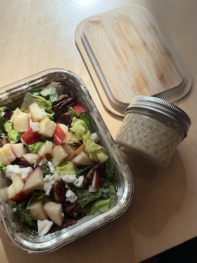Essential meal prep kitchen tools and gadgets organized on counter